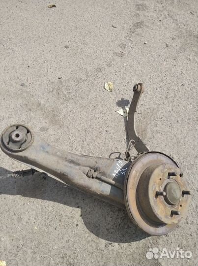 Задний левый кулак Митцубиси лансер 9