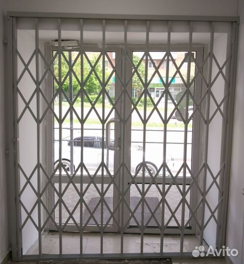 Раздвижные металлические решетки на окна