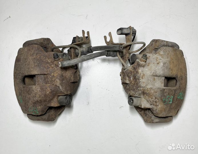 Суппорт передний тормозной VW Passat B5+ 1.8