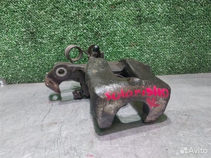 Суппорт тормозной задний левый Hyundai Solaris