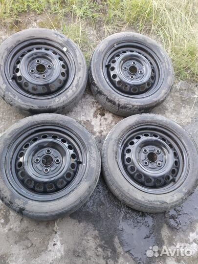 Колеса в сборе бу 155/65 R14 с колпаками н