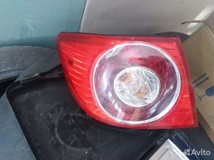 Фонарь левый шевролет