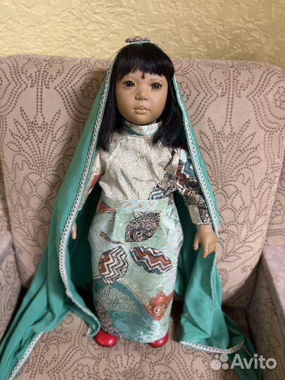 Виниловая кукла