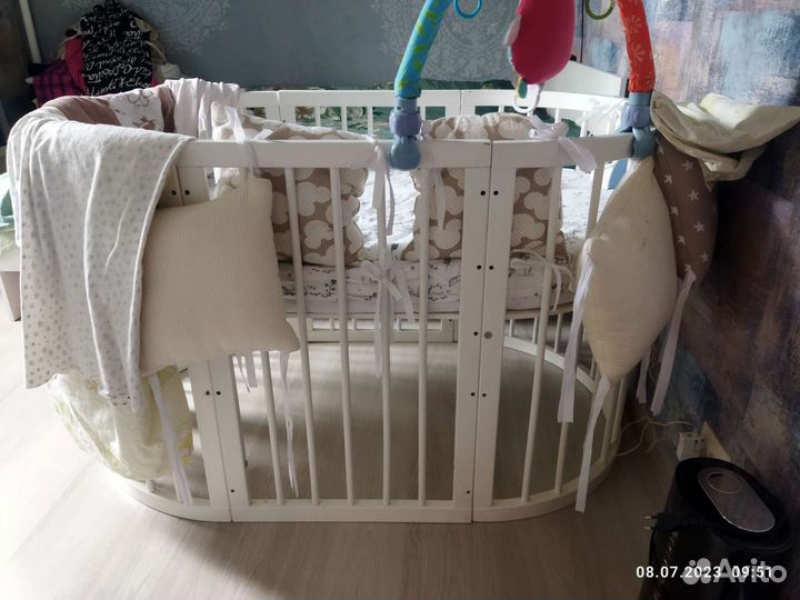 Детская кроватка трансформер с маятником