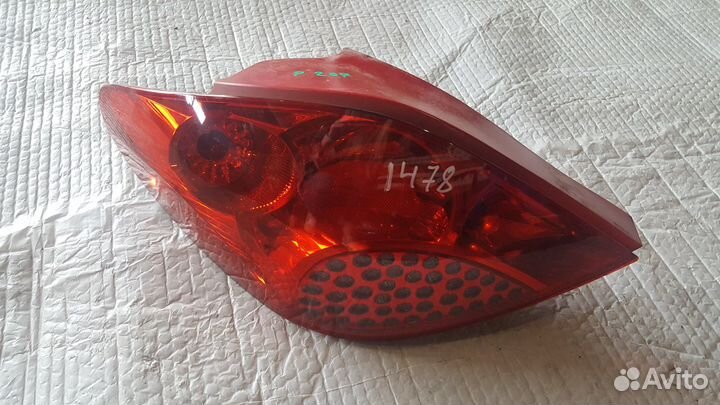 Фонарь левый Peugeot 207