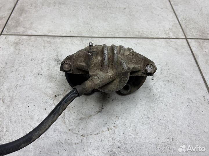 Тормозной суппорт передний левый ваз (LADA) Ока