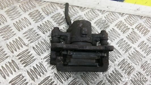 Суппорт тормозной задний правый toyota corolla E12