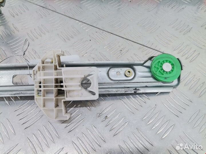 Стеклоподъемник Ford Focus рест. 2004