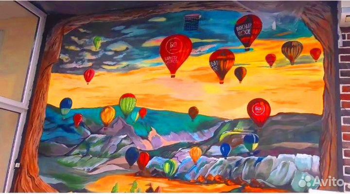 Рисунок на стене. Художник. Аэрография