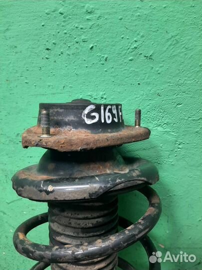 Стойка амортизатора передняя левая Subaru Foreste