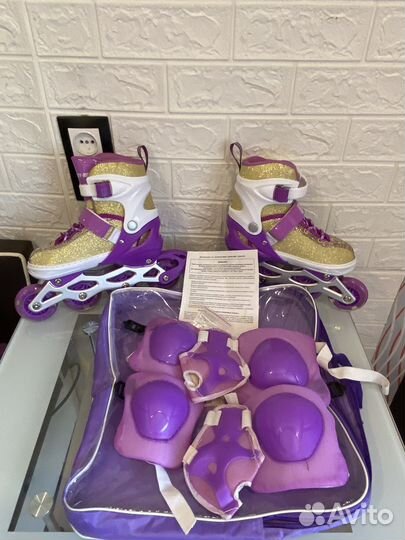 Роликовые коньки