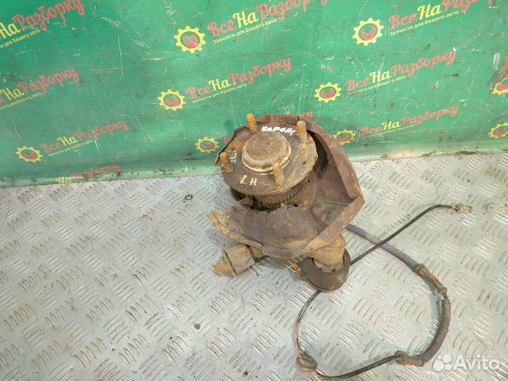 Кулак задний левый Kia Carens 2 хетчбек 2.0 2004