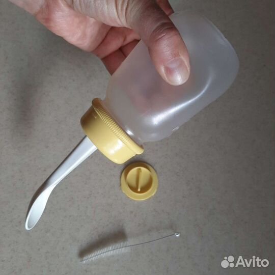 Бутылочка с ложкой для введения прикорма pigeon