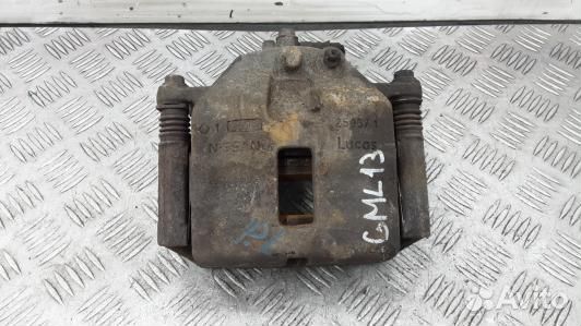 Суппорт тормозной передний левый nissan primera P1