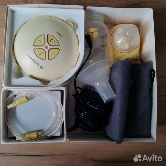 Молокоотсос medela электрический