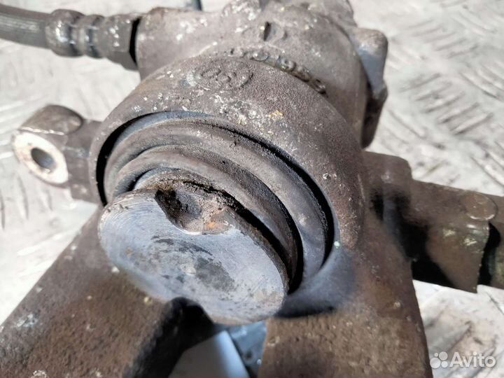 Суппорт задний правый Opel Corsa D