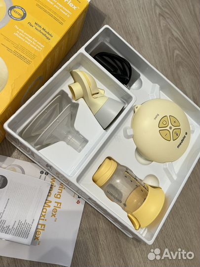 Молокоотсос medela swing flex электрический