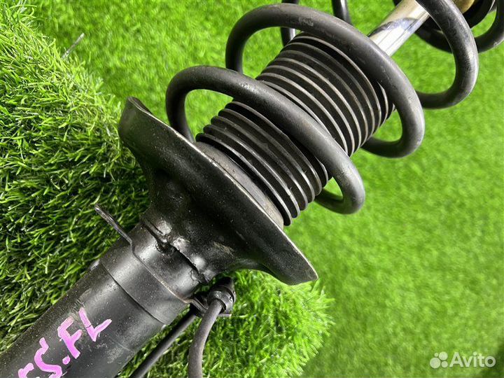 Стойка подвески 95 т. км передняя левая Volkswagen