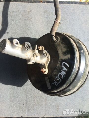 Вакуумный усилитель цилиндр главный Lancer 9