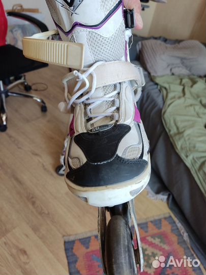 Роликовые коньки