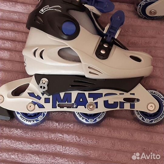 Роликовые коньки