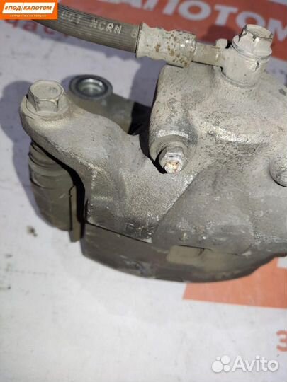 Суппорт тормозной передний правый Nissan Teana J32