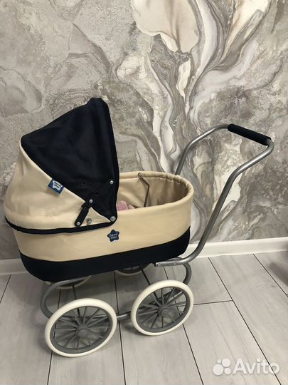 Игрушечная коляска для кукол