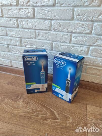 Электрическая зубная щетка oral b