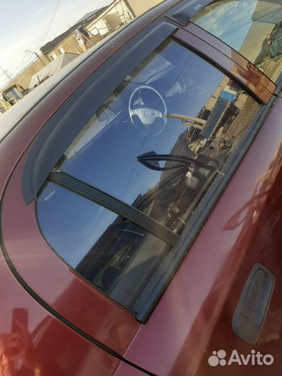 Правое заднее стекло Opel Astra G