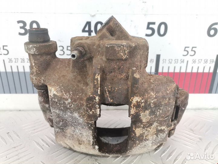 Суппорт передний правый Ford Escort 5 рест. 1994