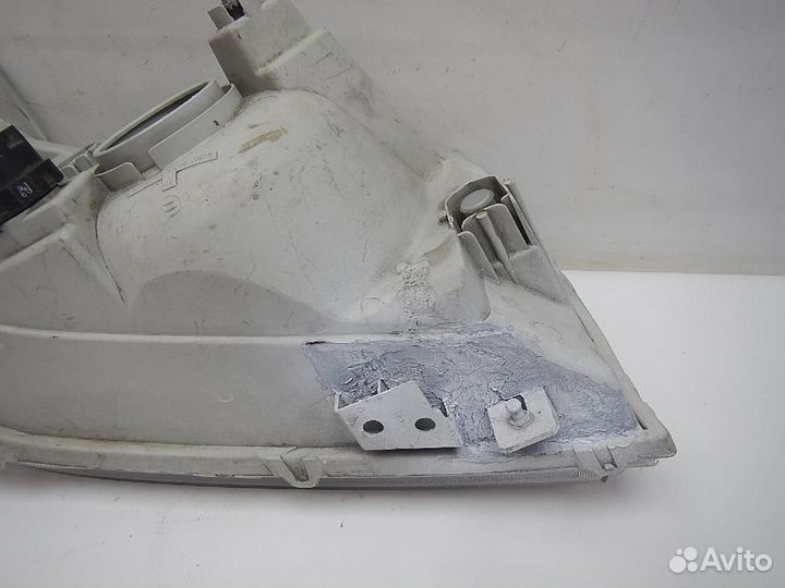 Фара левая Suzuki Grand Vitara