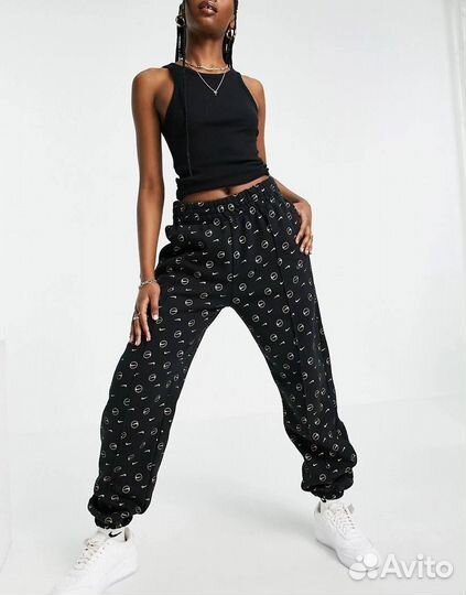 Черные джоггеры со сплошным принтом nike