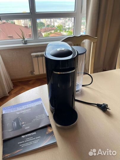 Капсульная кофемашина delonghi