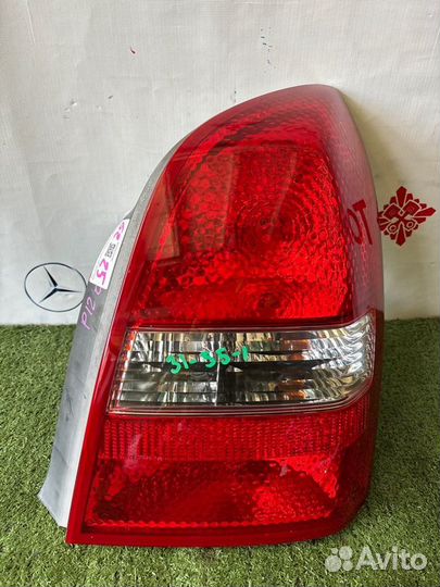 Фонарь правый Nissan Primera HP12