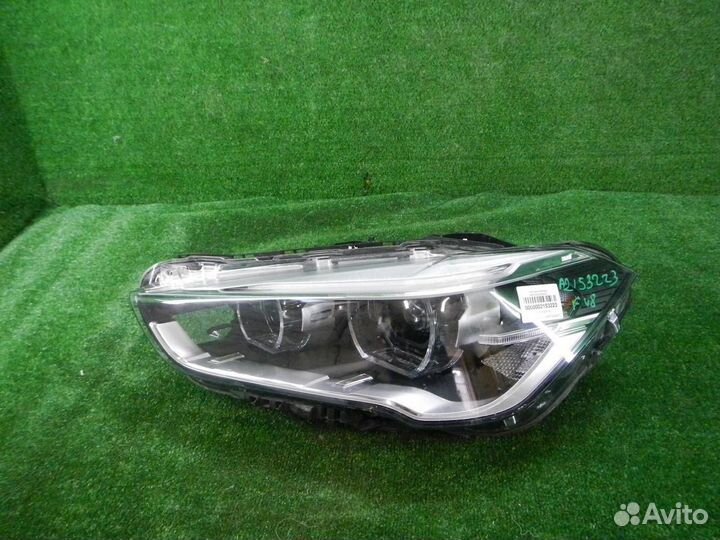 Фара левая BMW X1