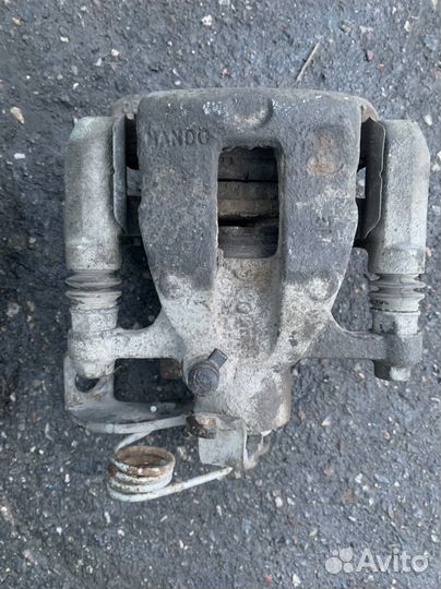 Суппорт задний левый Hyundai Solaris Kia Rio