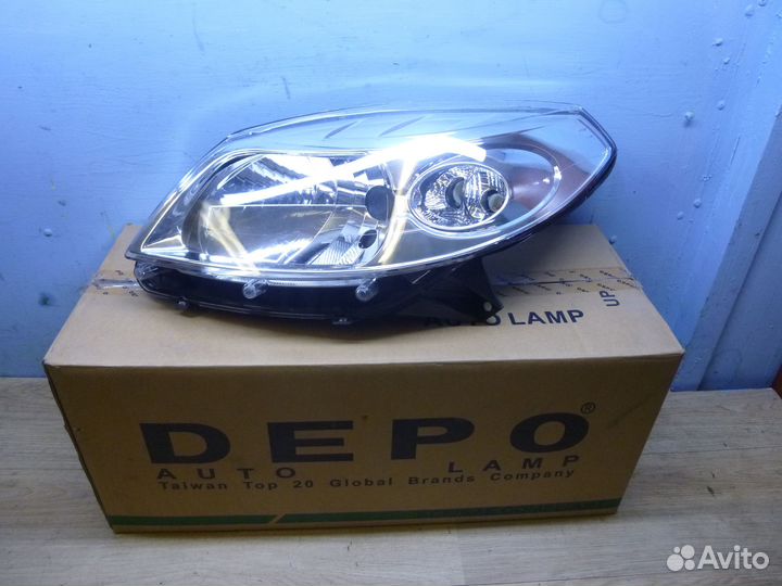 Фара левая Renault Sandero 1