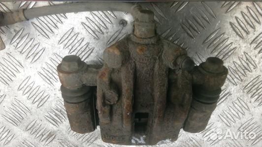 Суппорт тормозной задний правый KIA RIO 2 (EDN17OO