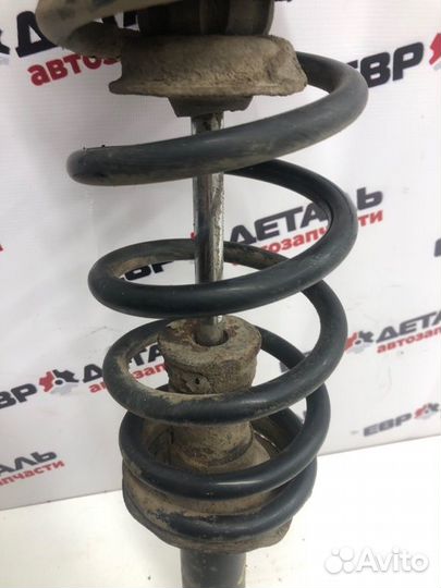 Амортизатор подвески задний левый Nissan Almera