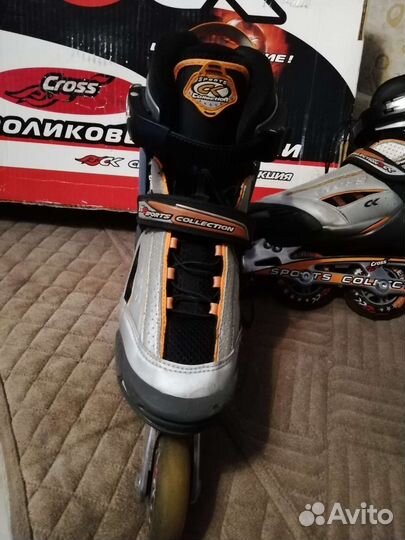 Роликовые коньки