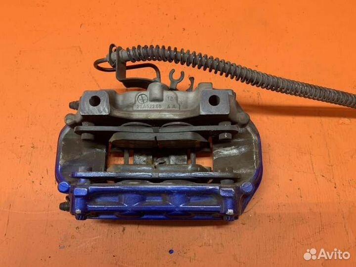 Суппорт тормозной задний левый Porsche Cayenne 958