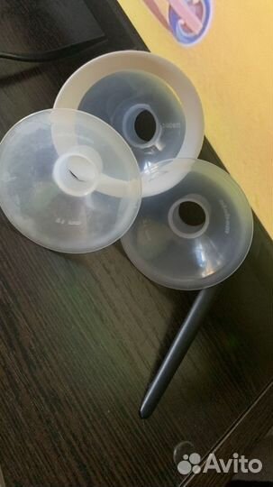 Молокоотсос medela с доп. воронкой(торг)