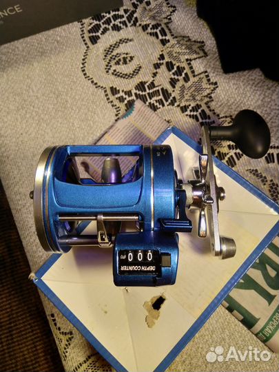 Спиннинг и катушка для троллинга новые