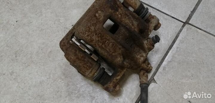 Суппорт задний левый Kia Soul AM 2009-2014