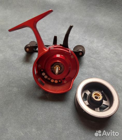 Катушка зимняя мультипликаторная Team Dubna