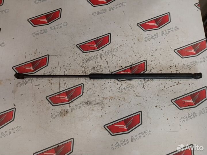 Амортизатор двери багажника Опель Астра J хетчбэк