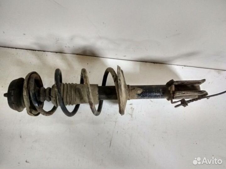 Амортизатор передний Renault Logan 1 K7M710 2006