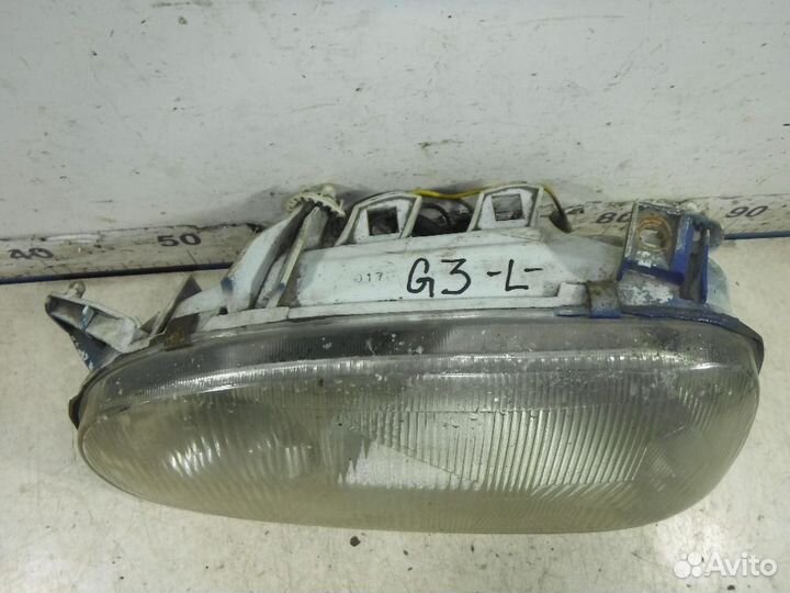 Фара левая VW Golf III
