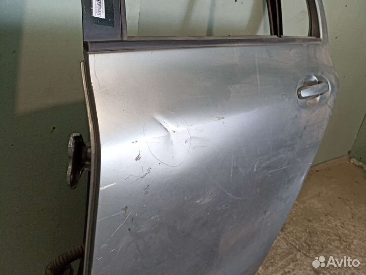 Дверь задняя левая Toyota Vitz SCP90