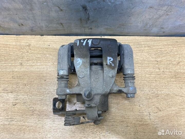 Суппорт тормозной задний правый Kia Rio 3 седан